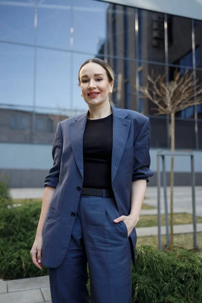 Portrait of a business woman in a suit outdoor