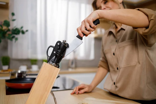 Woman Pulling Out Kitchen Knife Wooden Block — Stock Photo, Image