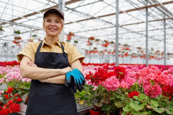 Woman Florist Crossed Arms Gardening Gloves Flower Greenhouse — Stockfoto
