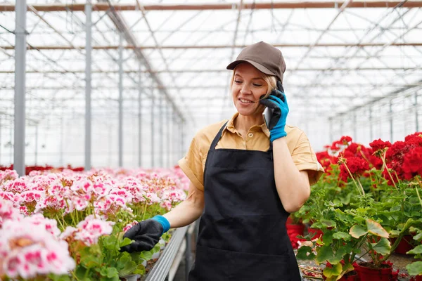 Portrait Pretty Mature Florist Woman Talking Phone Greenhouse — Stockfoto