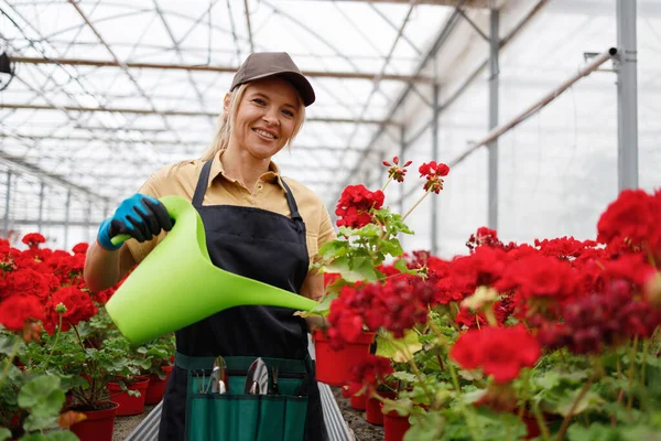 Portrait Pleasant Female Florist Watering Potted Plants Greenhouse Watering Can — Stockfoto