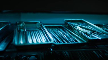 Process of sterilizing dental instruments under ultraviolet light