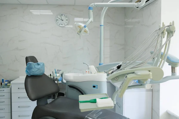 Dental chair in modern dentist office