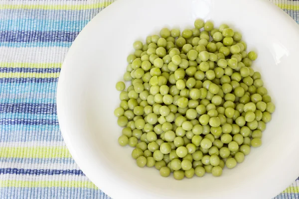 Bowl of green peas — Stock Photo, Image
