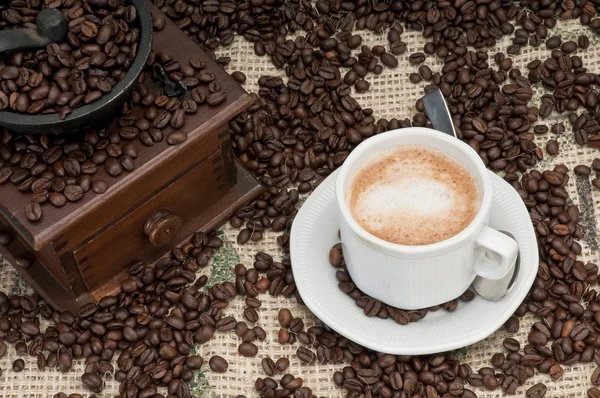 Old grinder of coffee and capuccino — Stock Photo, Image