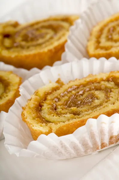 Caramel roll dessert in trays — Stock Photo, Image