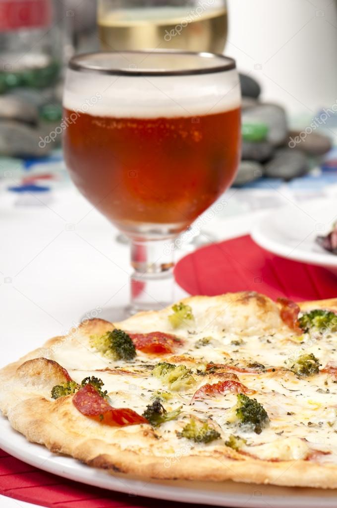 Pizza and glass of beer