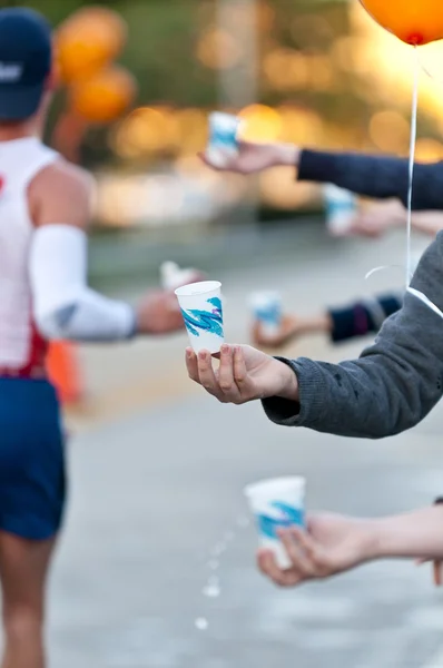 Água durante uma maratona — Fotografia de Stock