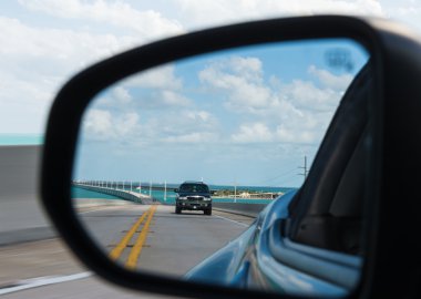 Seven Mile Bridge reflected in car mirror clipart