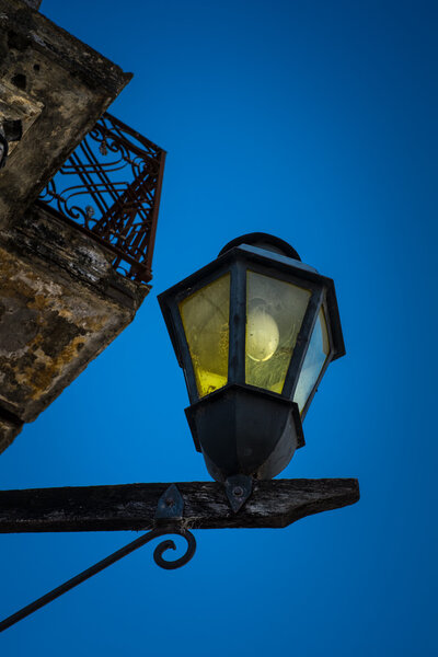 Typical antique lamp in the streets of Colonia del Sacramento, Uruguay