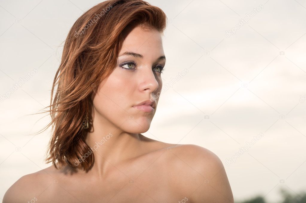 Young woman looking away outdoors
