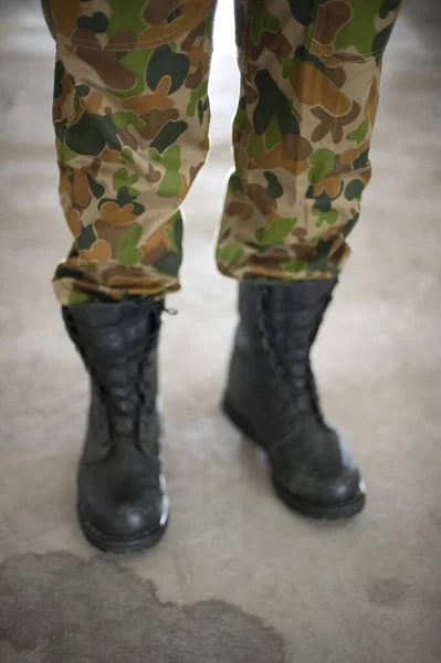 army combat pants made with camouflage pattern fabric