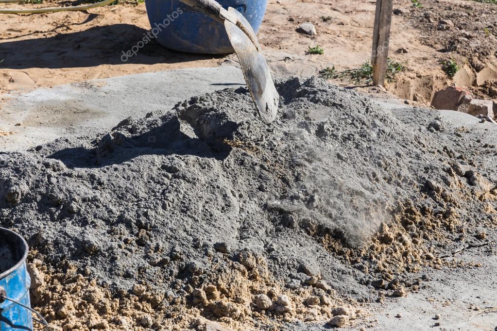 Mixing cement and sand — Stock Photo © zhykova #50241167