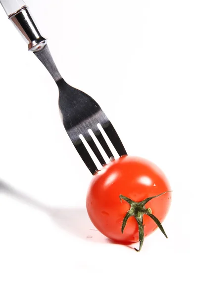 Pomodoro su una forchetta con un angolo — Foto Stock