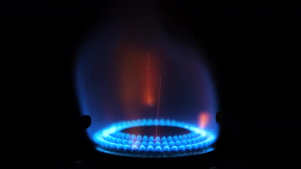 Gas stove being turned on isolated on black background. Natural gas deficit concept. 4k resolution video — Stock Video