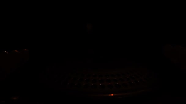 Gas stove being turned on isolated on black background. Natural gas deficit concept. Full HD slow motion video. — Wideo stockowe