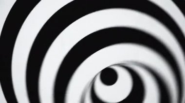 Siyah ve beyaz göz yanılsaması. 4k çözünürlüklü soyut video.