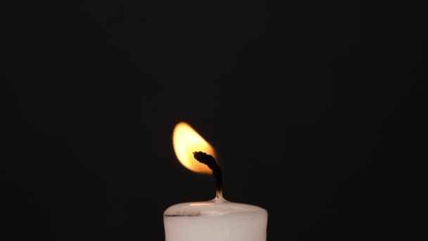White Single Candle Flickering Dark Side View White Candle Burning — Stock Video