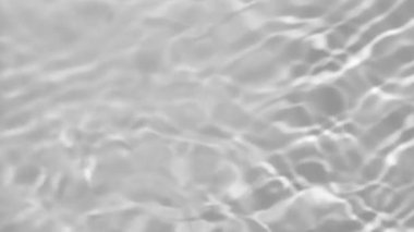 Transparent clear calm water surface texture with waves, splashes and bubbles. Trendy abstract nature background. White grey water waves in sunlight. Slow motion Full HD video banner.