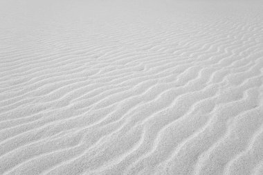 Duvar kağıdı ve poster için plaj kum dokusu arkaplanını kapat. Kumsal. Yan Üst Görünüm.