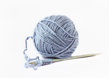ball of yarn and knitting needles clipart