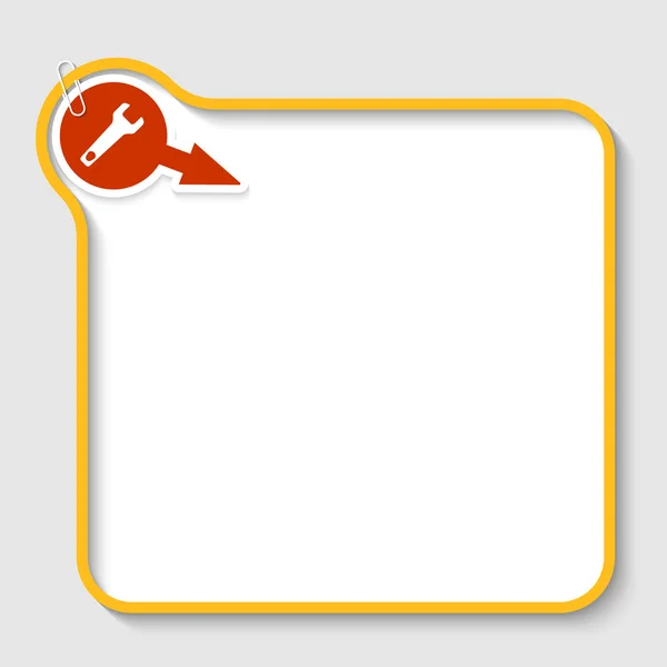 Marco de texto vector amarillo con llave y clip de papel — Vector de stock