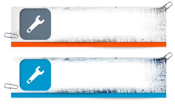 Set van twee vuile banners met spanner — Stockvector