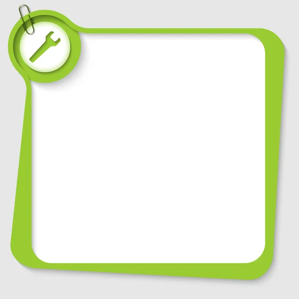 Caixa de texto em branco verde com chave e clipe de papel —  Vetores de Stock