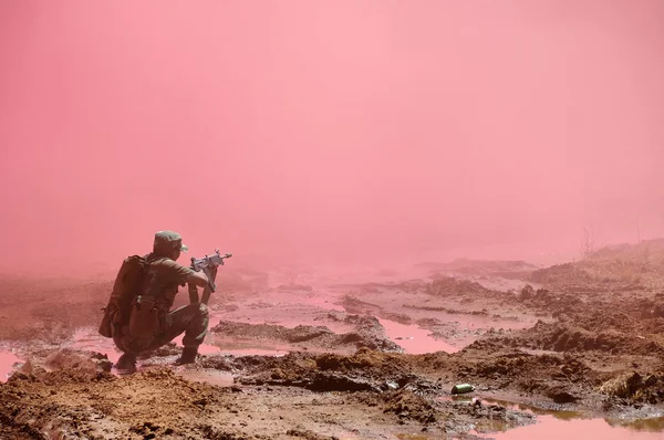 Soldier using smoke screen to hide — Stock Photo, Image