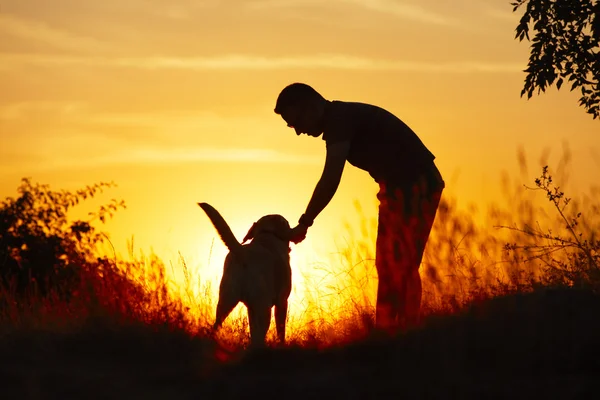 Hombre con perro — Foto de Stock