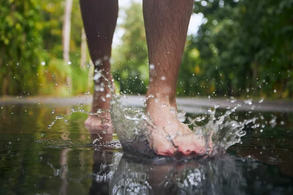 Barefoot Leg Young Man Stepping Puddle Splashing Water Rainy Day — Stockfoto