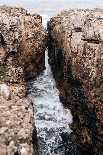 Nature. Ocean waves in the gorge of rocks.Portugal