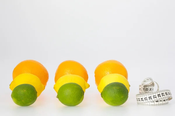 Citrus Fruits and Measuring Tape — Stock Photo, Image