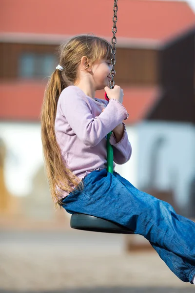 Girl on zip line — Stock Photo, Image