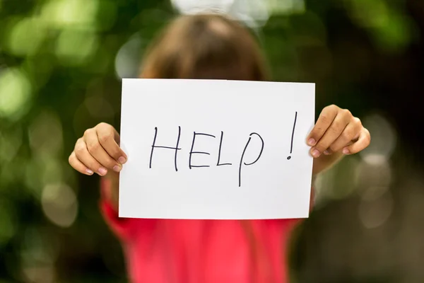 Girl with Help sign — Stock Photo, Image