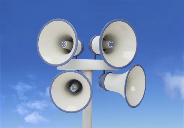 Four megaphones on the pole — Stock Photo, Image