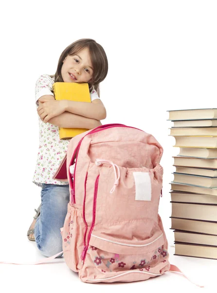 Schülerin mit Bücherrucksack — Stockfoto