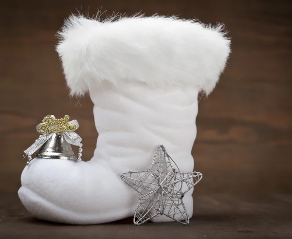 Santa's boot with shiny ornament — Stock Photo, Image