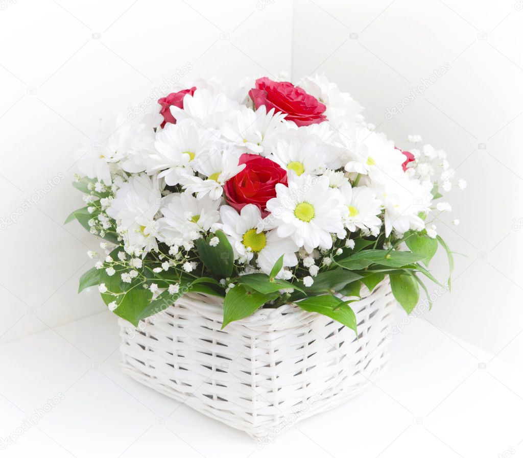 White Flowers arranged in a basket