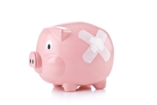 Piggy Bank con vendaje adhesivo — Foto de Stock