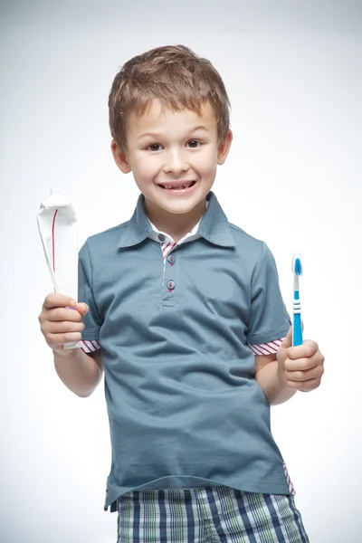 Cute little boy brushing teeth — Stock Photo, Image