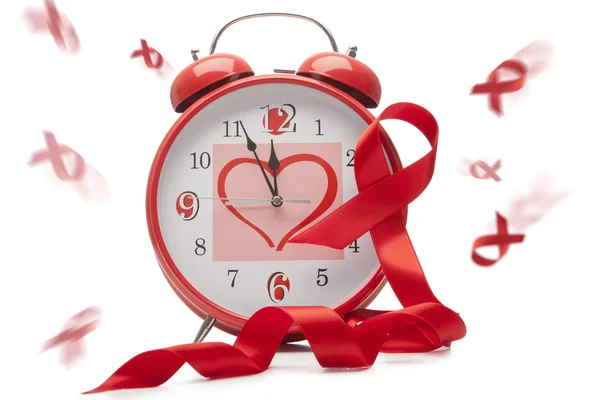 Aids red ribbon and clock — Stock Photo, Image