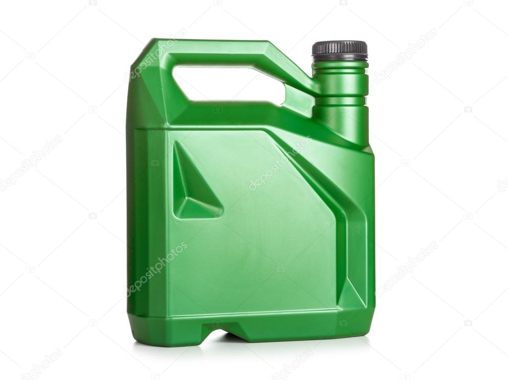 Green plastic canister of motor oil isolated on white background