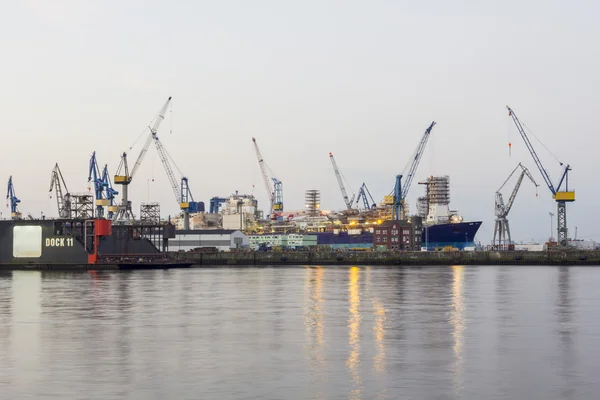 Shipyard with ships and cranes Royalty Free Stock Images