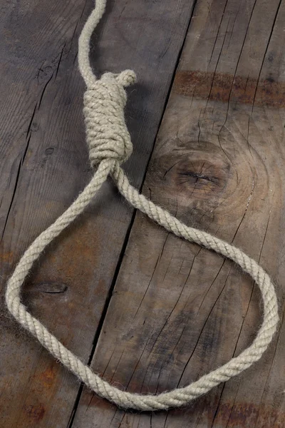 Noose on wooden background — Stock Photo, Image