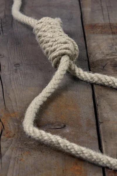 Noose on wooden background — Stock Photo, Image