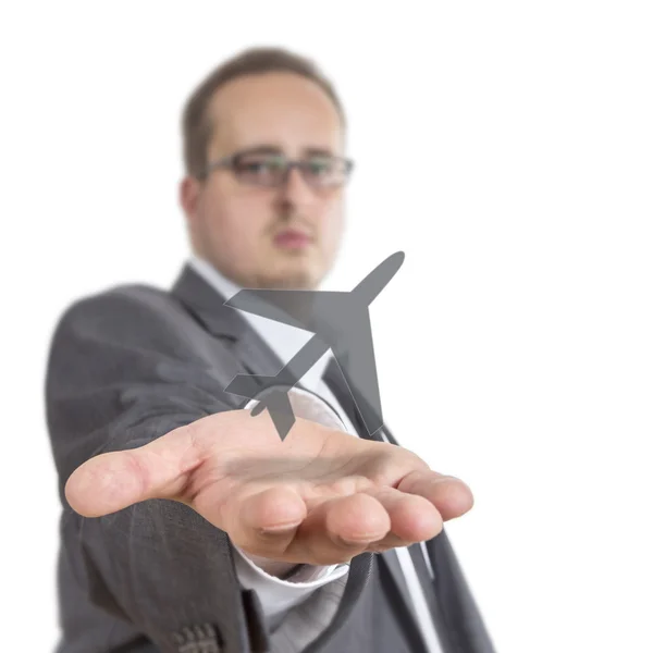 Business man holding aircraft Symbol — Stock Photo, Image