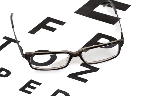 Brille und Sehtest — Stockfoto