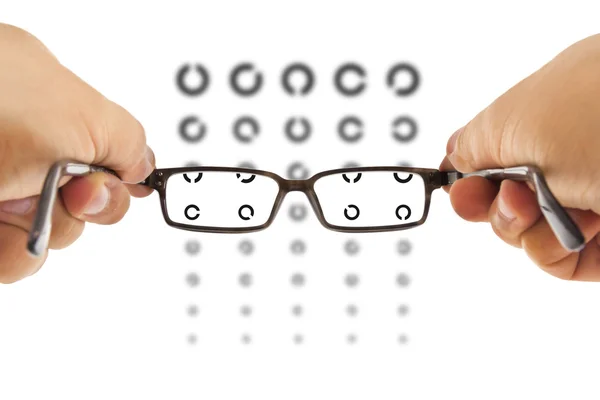 Brille und Sehtest — Stockfoto