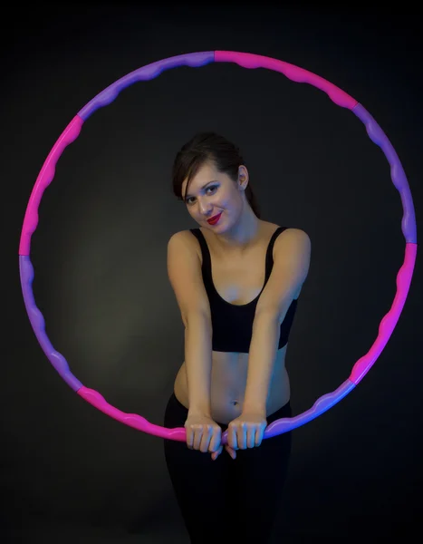 Fitness woman with hula-hoop — Stock Photo, Image